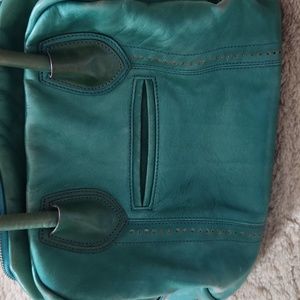 Old Trend gently used pocketbook, 11x14 inches. Turquoise